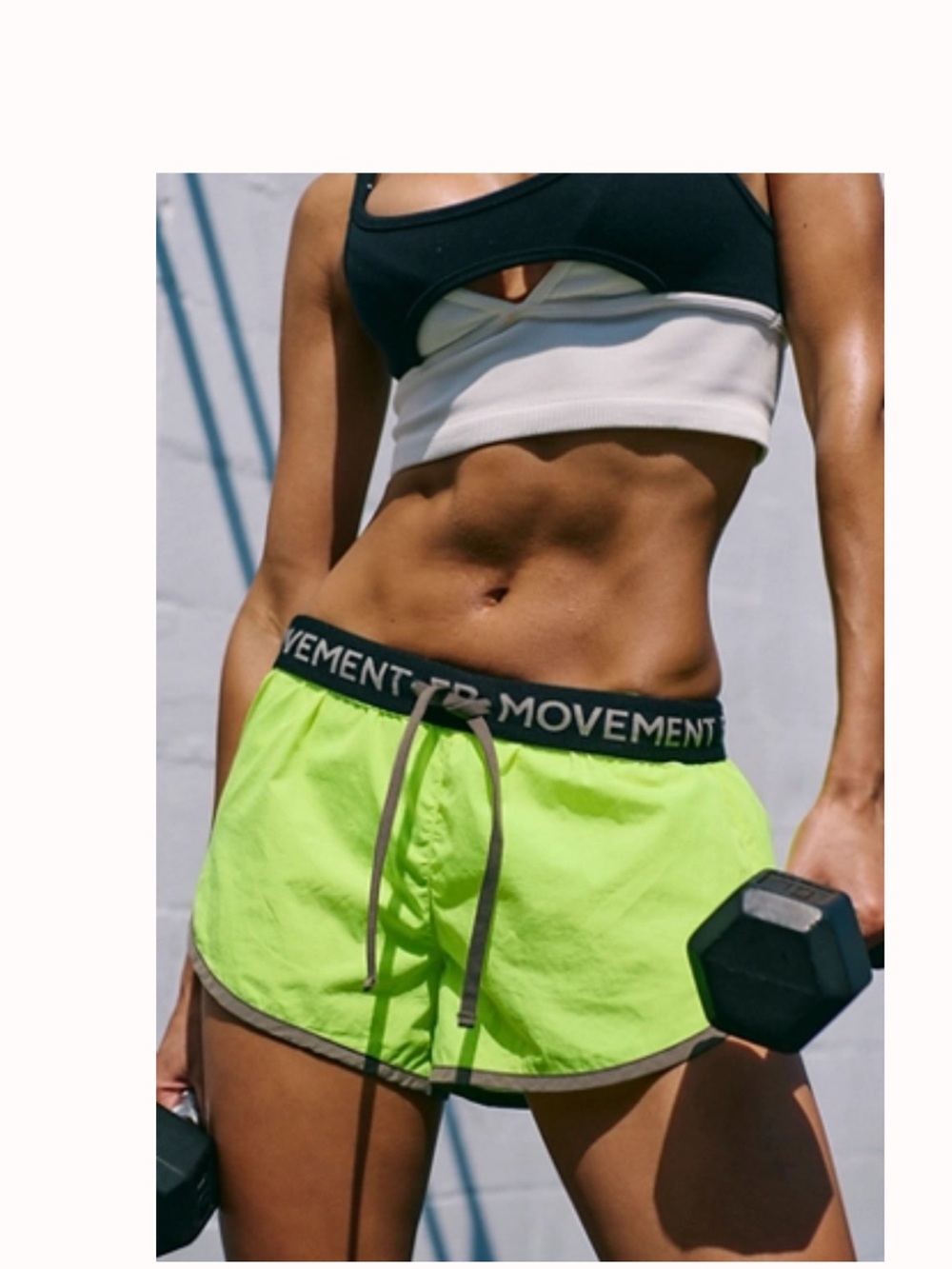 FP Movement Now or Never Run Shorts in highlighter yellow.